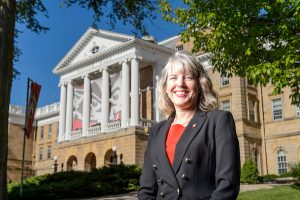 Lori Reesor, vice chancellor for student affairs, standing in front of Bascom Hall.