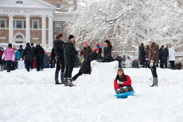 Students converge on Bascom Hill to play in the fresh snow and sled down portions of the hill.